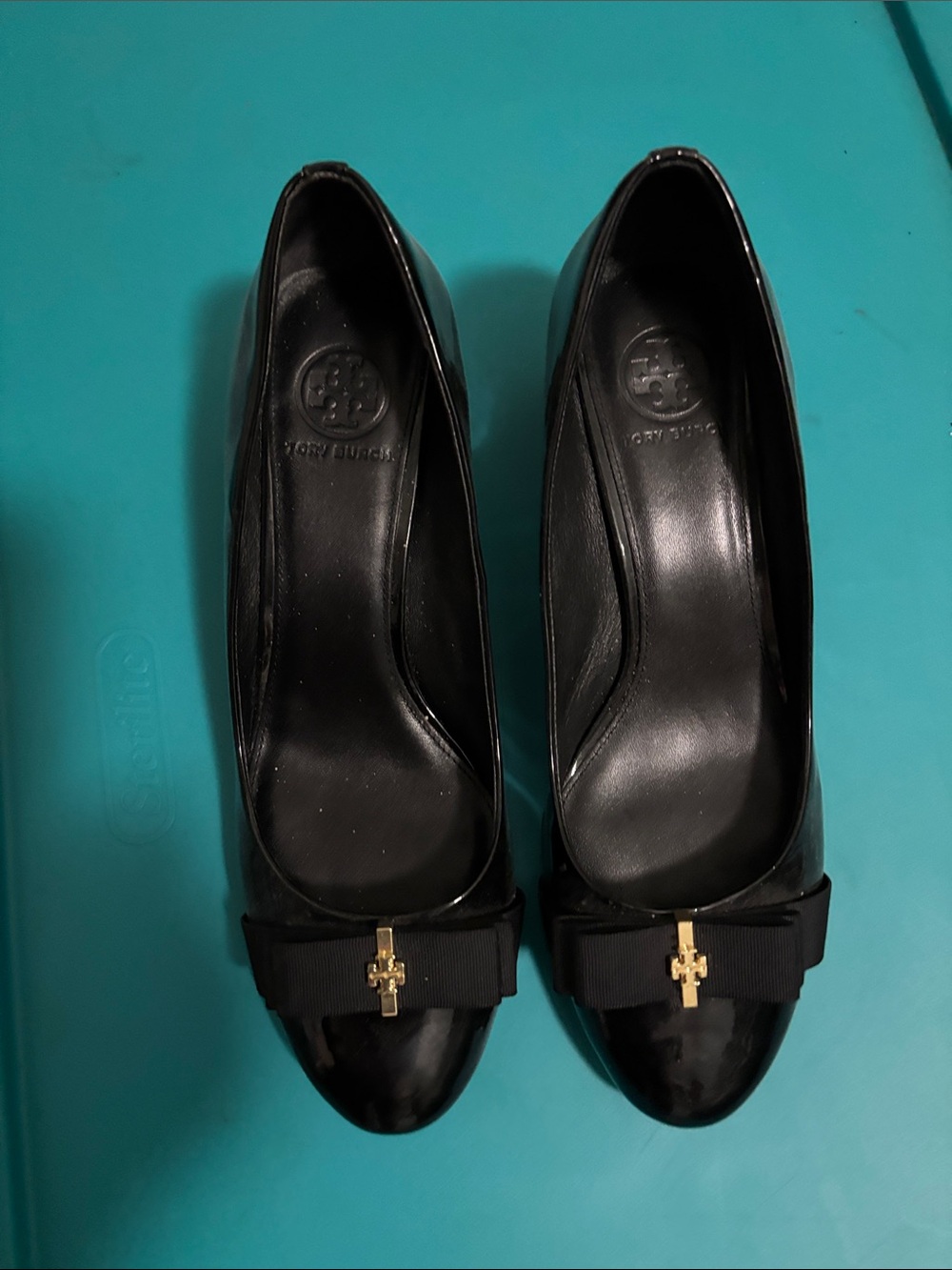 Tory Burch Black Patent Leather Bow Pumps with Gold Logo